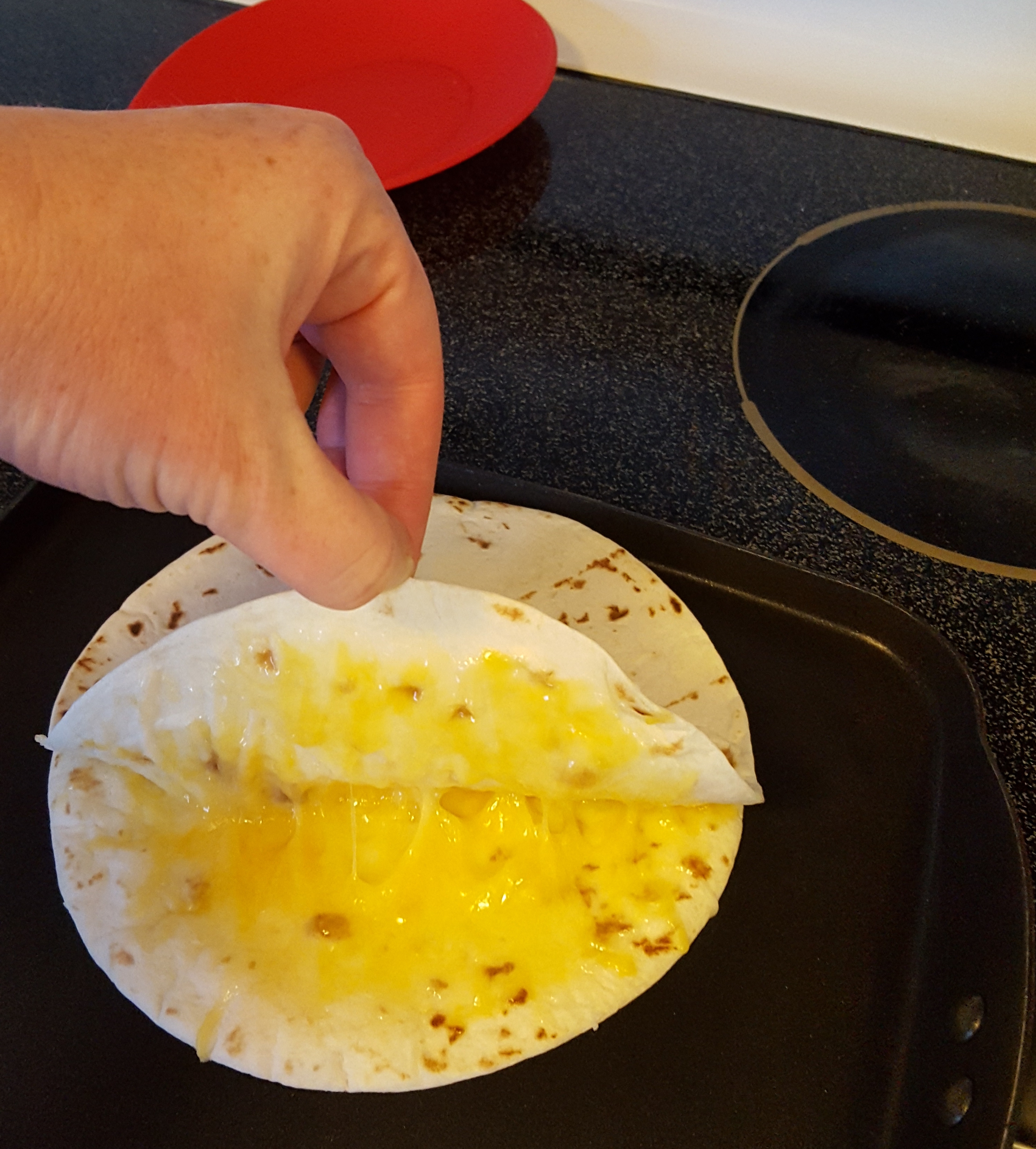 cooking quesadilla