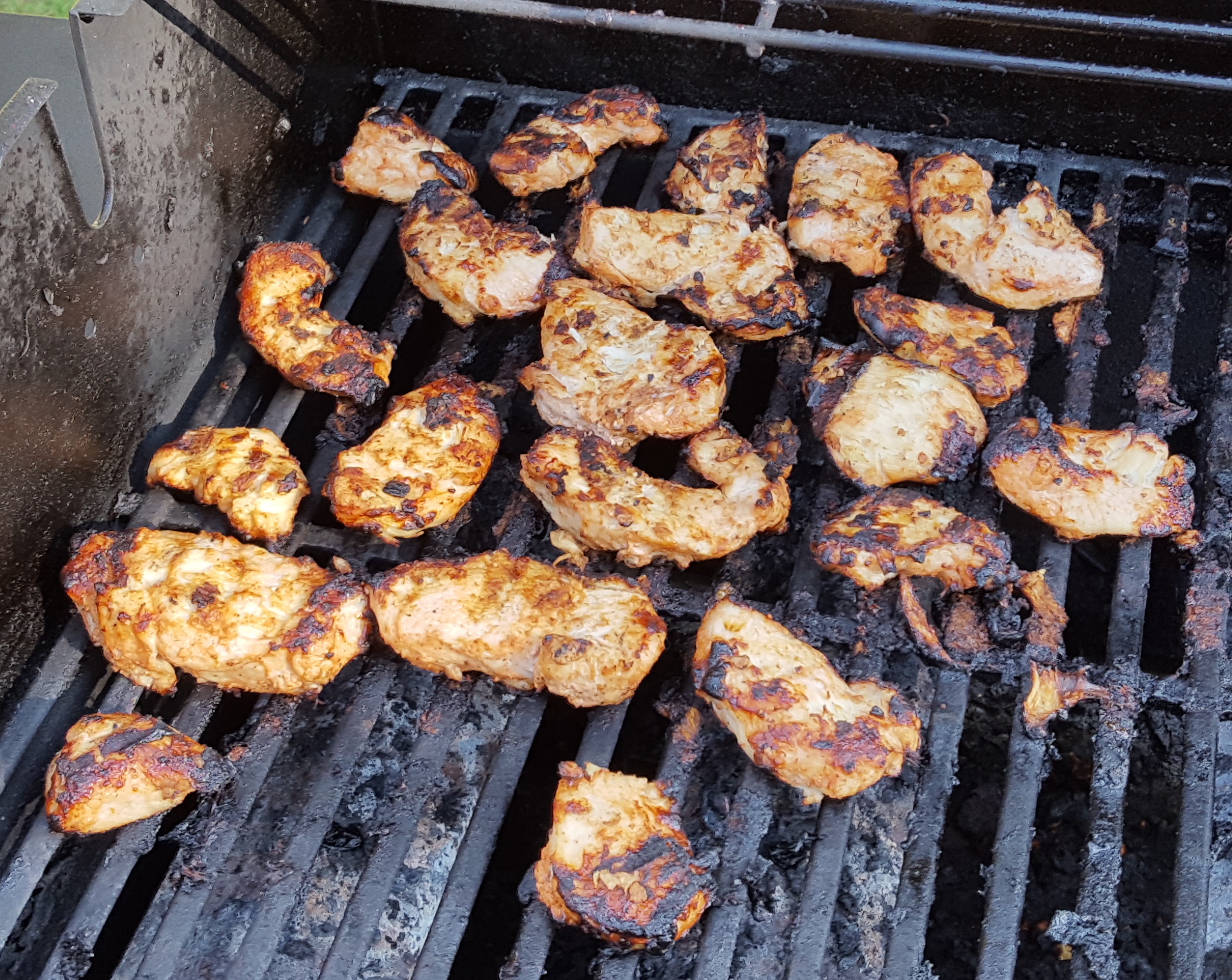 Tandoori chicken on the grill.jpg