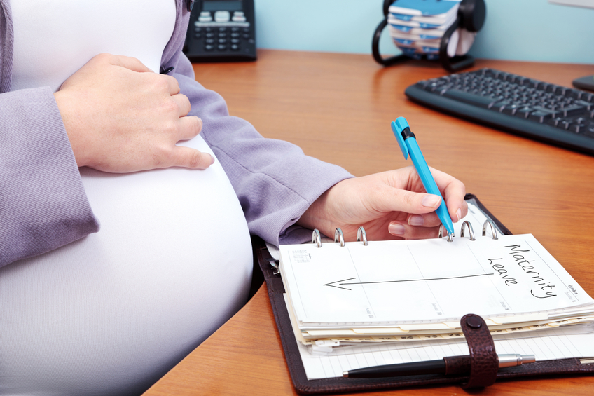 Pregnant woman planning maternity leave