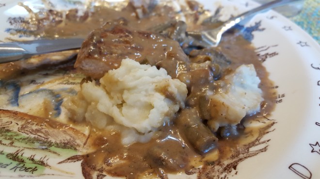 Forkful of pork and mash